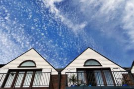 apartments-balcony-clouds-439404