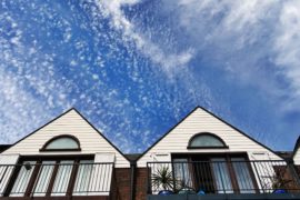 apartments-balcony-clouds-439404