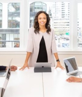 woman-standing-on-the-center-table-with-four-people-on-the-1367271