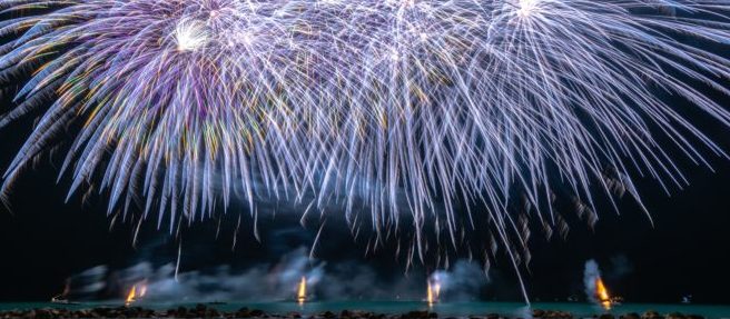 photo-of-fireworks-near-sea-1573722