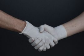 people-shaking-hands-in-latex-gloves-3959482