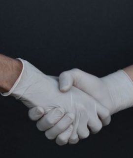 people-shaking-hands-in-latex-gloves-3959482