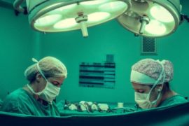 two-person-doing-surgery-inside-room-1250655